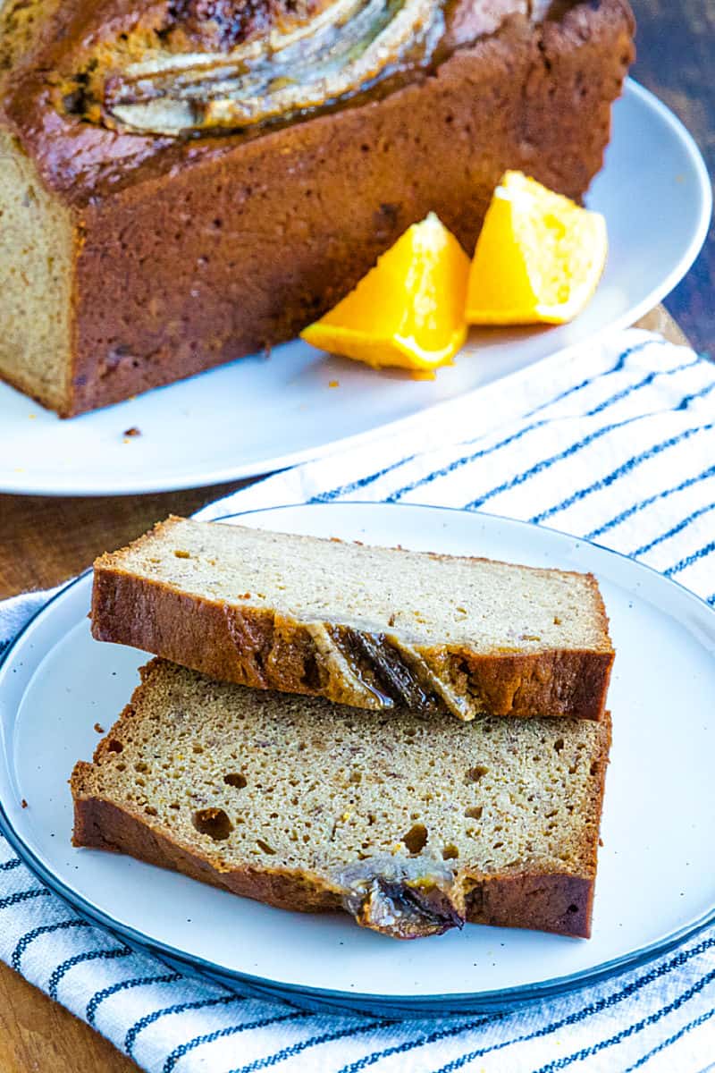 Easy "tried-and-true' homemade Banana Bread recipe that is the best way to use up over-ripe bananas. Made with brown sugar for a moist, dark loaf perfect to go with morning coffee or serve as dessert! #mustlovehomecooking