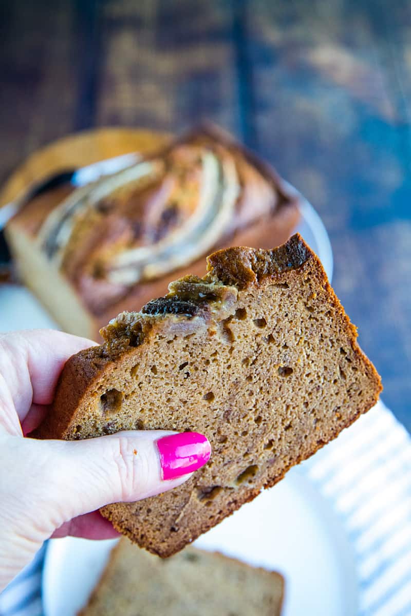 Easy "tried-and-true' homemade Banana Bread recipe that is the best way to use up over-ripe bananas. Made with brown sugar for a moist, dark loaf perfect to go with morning coffee or serve as dessert! #mustlovehomecooking