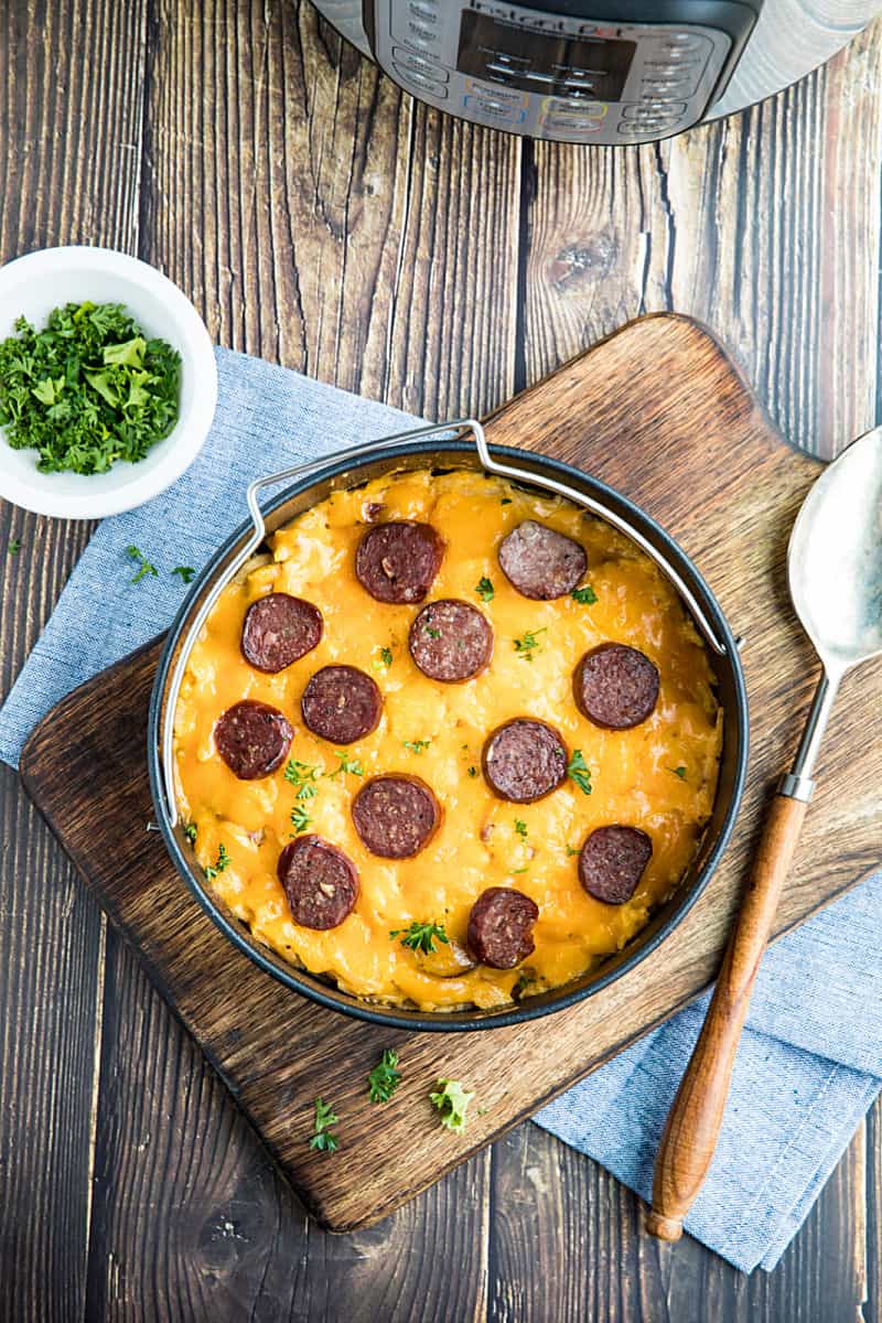 Instant Pot Cheesy Sausage Potatoes is easy to make in the pressure cooker as a delicious main dish for brunch or dinner. #mustlovehomecooking