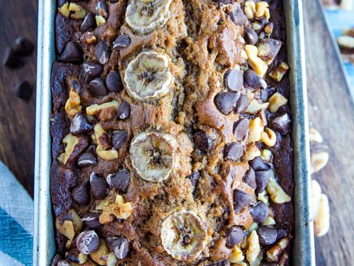 Banana Bread with Chocolate Chips and Walnuts is a super moist and tender quick bread perfect for using up ripe bananas. Great as a snack, dessert or breakfast with your morning coffee!