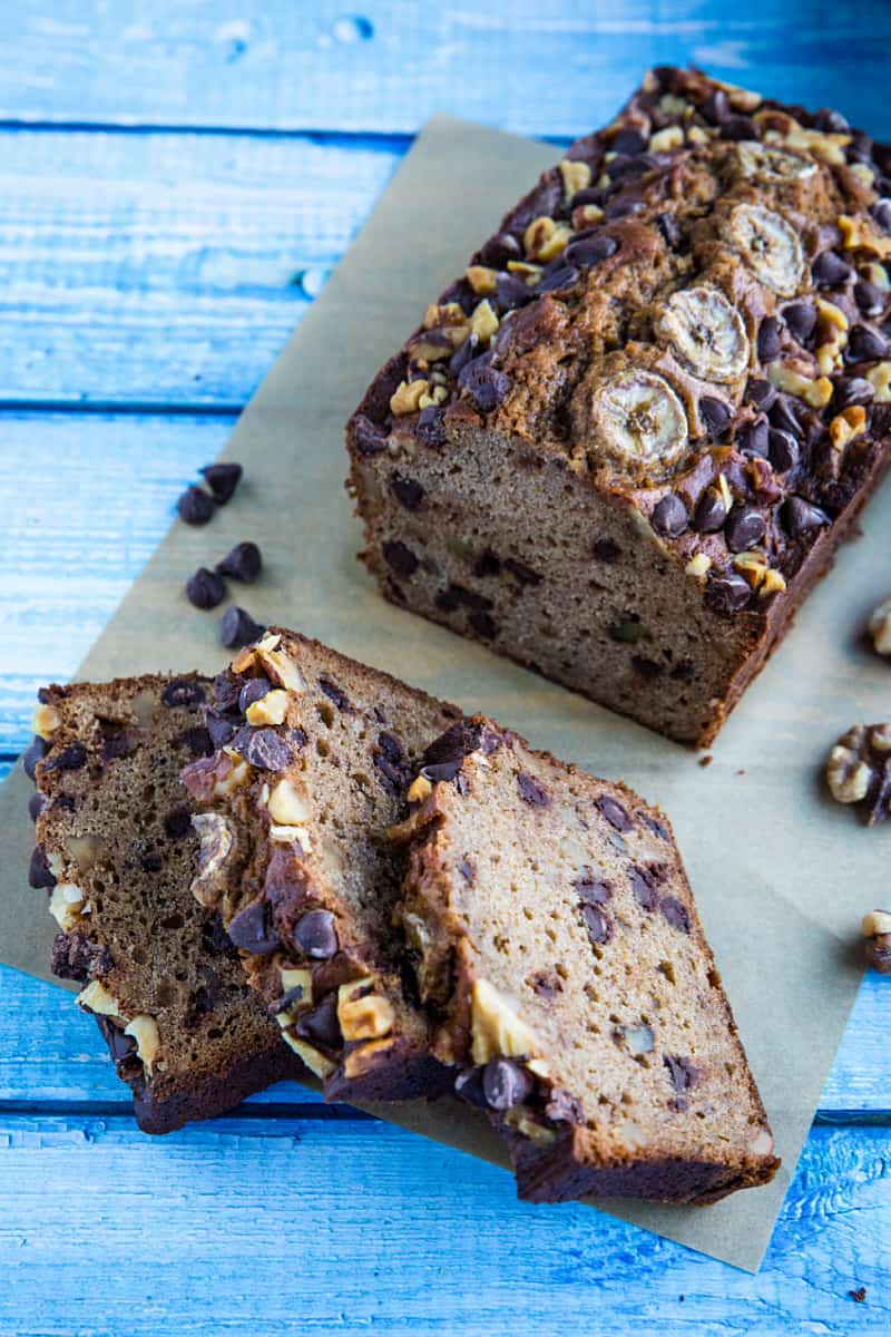 Banana Bread with Chocolate Chips and Walnuts is a super moist and tender quick bread perfect for using up ripe bananas. Great as a snack, dessert or breakfast with your morning coffee! #mustlovehomecooking