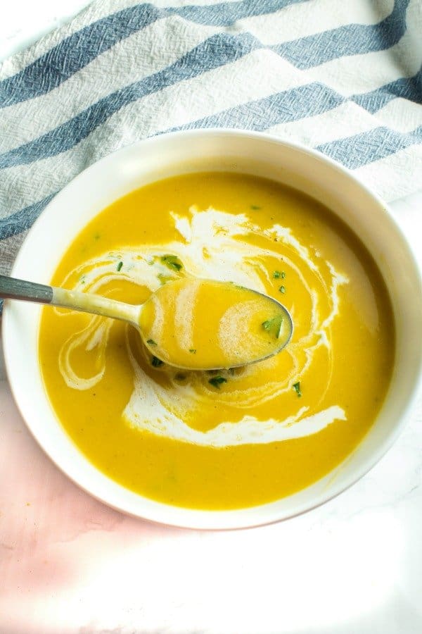 Prepared butternut squash soup in bowl 
